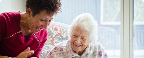 mom and daughter laughing