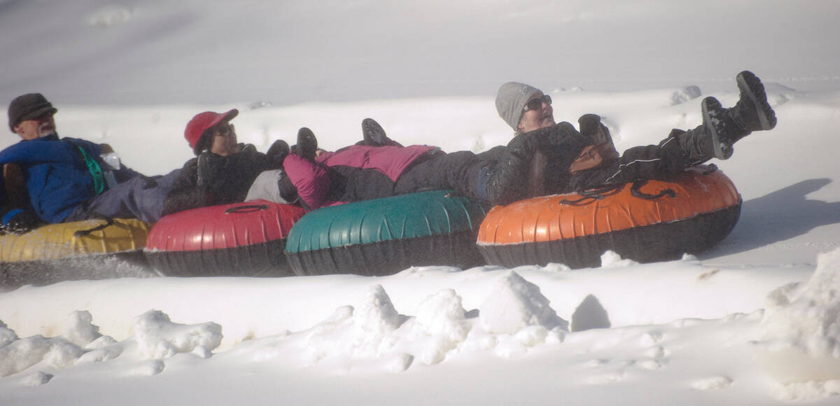 residents snow tubing