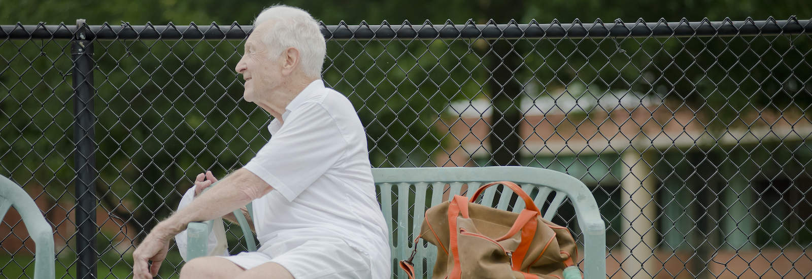 resident playing tennis