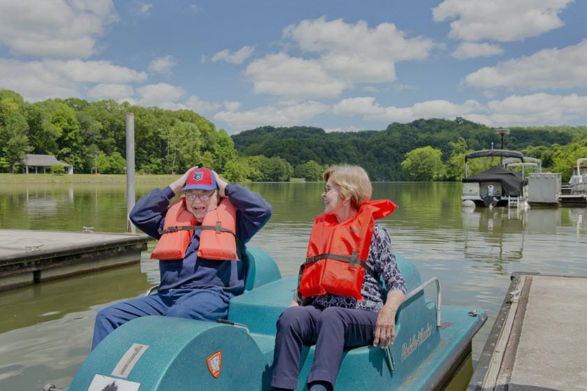residents enjoying paddle boating at asbury place kingsport