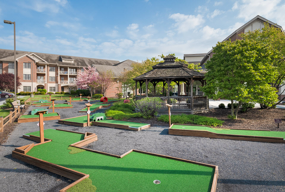 mini golf course at bethany village with gazebo in background