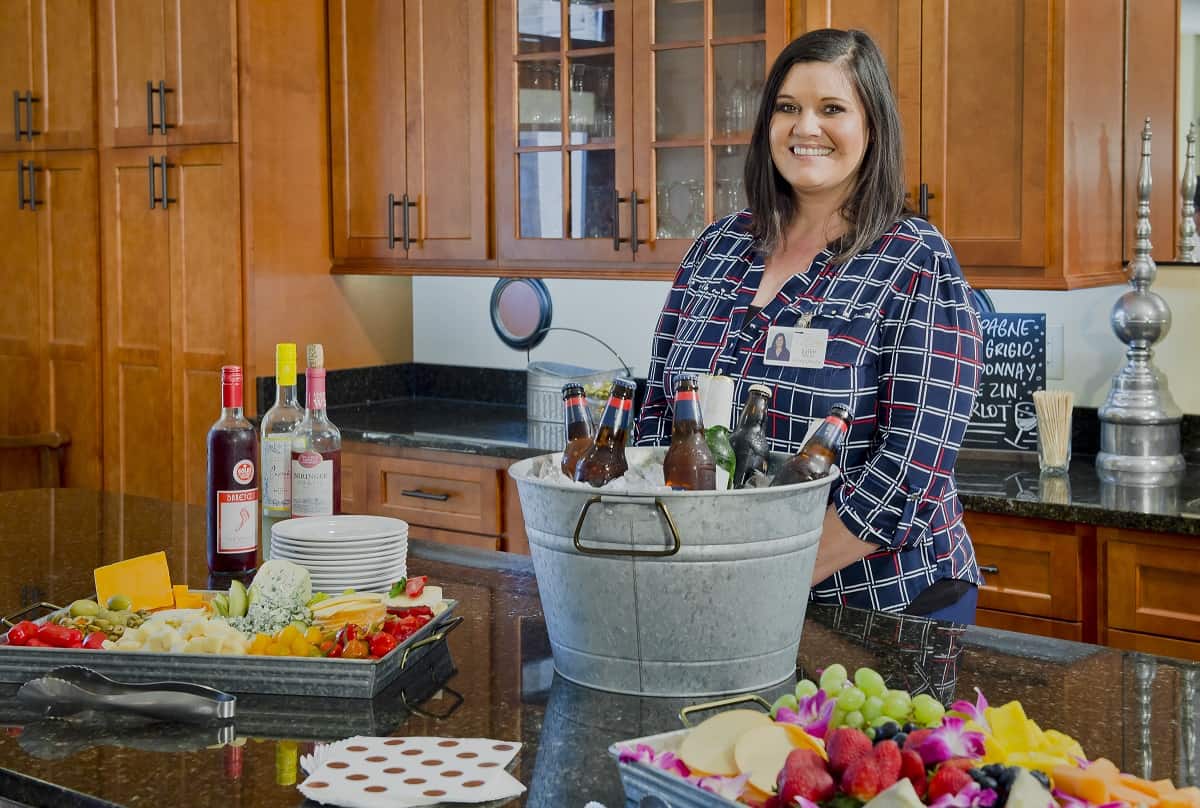 Staff member hosting happy hour at Asbury Place Kingsport