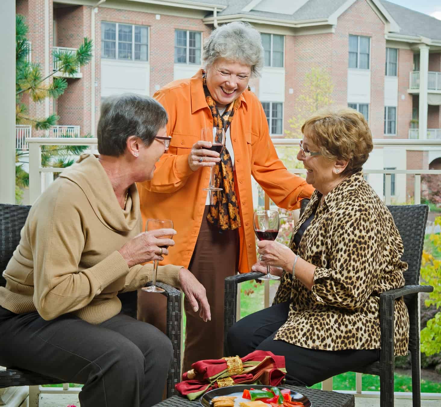 residents socializing on the back patio