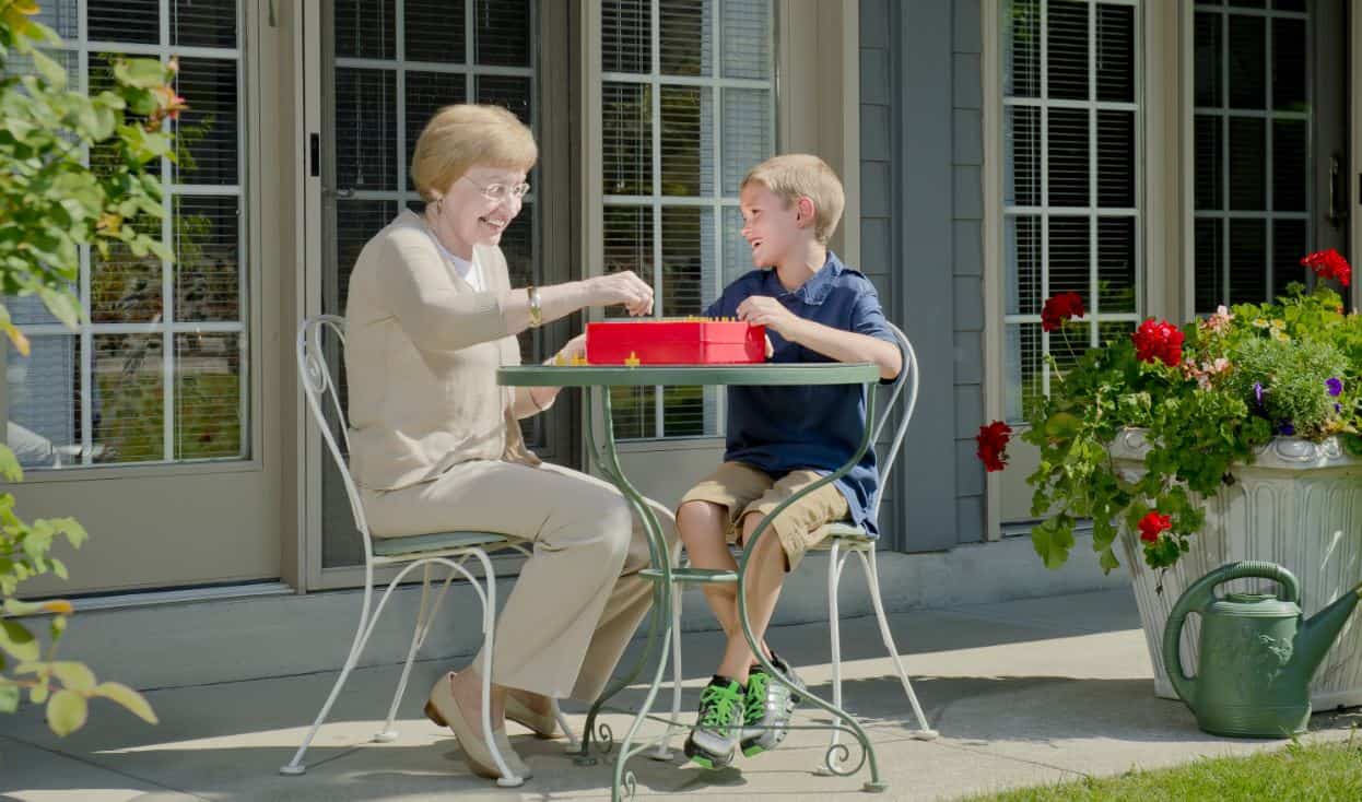 grandmother enjoying games with grandson