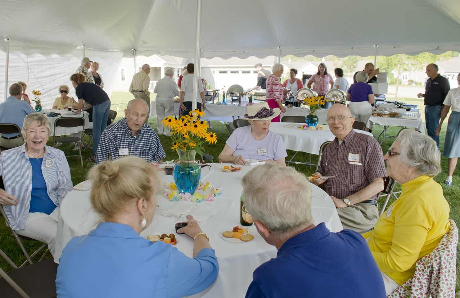 residents celebrating at an outdoor party