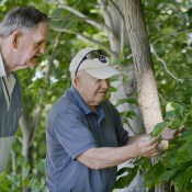 Dr. Ed Masteller in one of Springhill's gardens with a friend. 