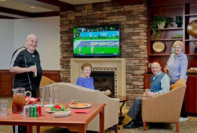 residents watching football game