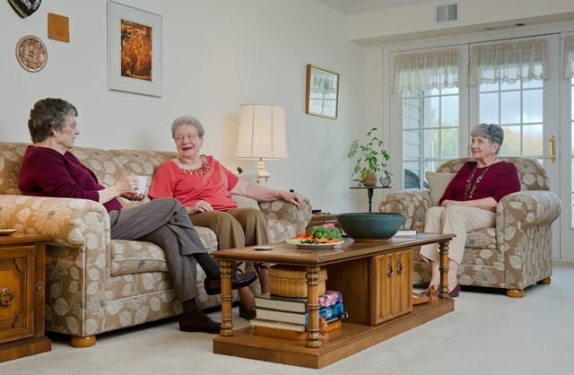 ladies chatting together in apartment