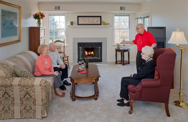 residents entertaining friends in thier garden home