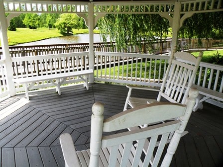 rocking chairs and benches in the gazebo