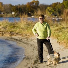 resident and dog on beach