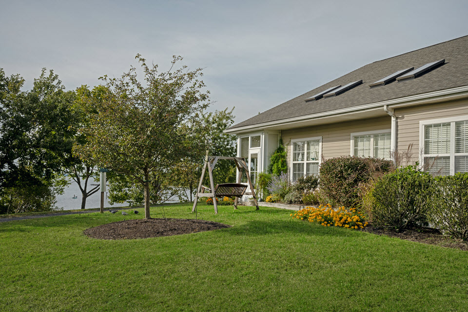 side exterior view of cottage home