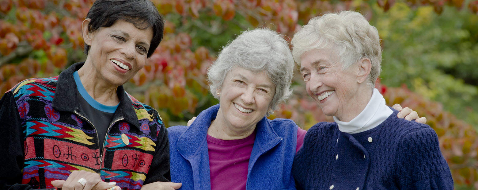 seniors smiling together outside