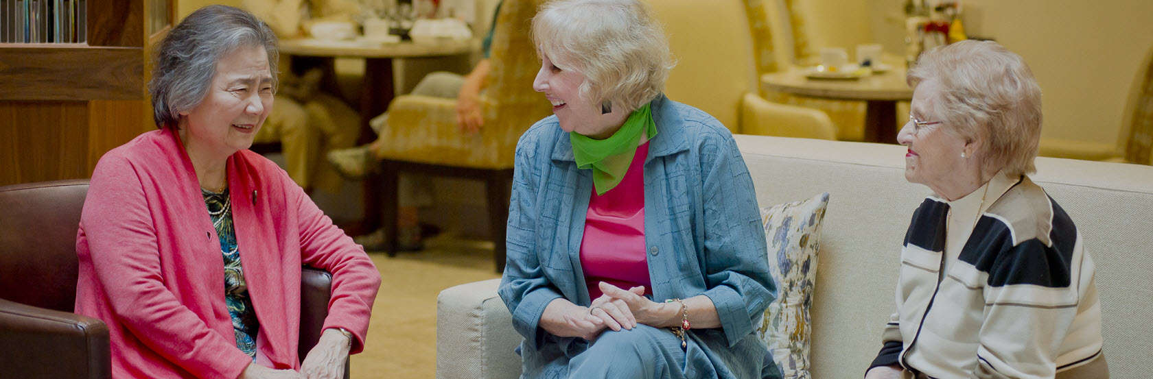 three senior women chatting