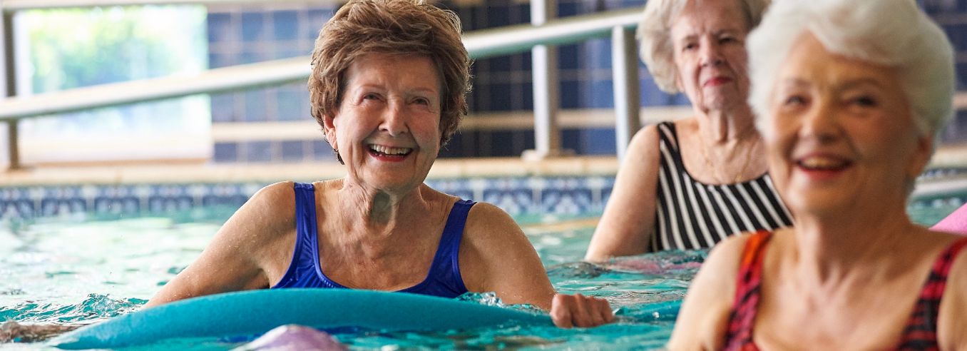 residents enjoying pool activities