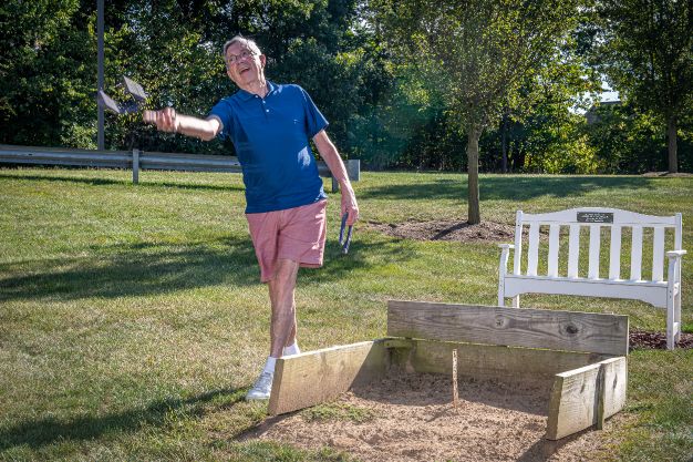 residents playing horseshoes at normandie ridge