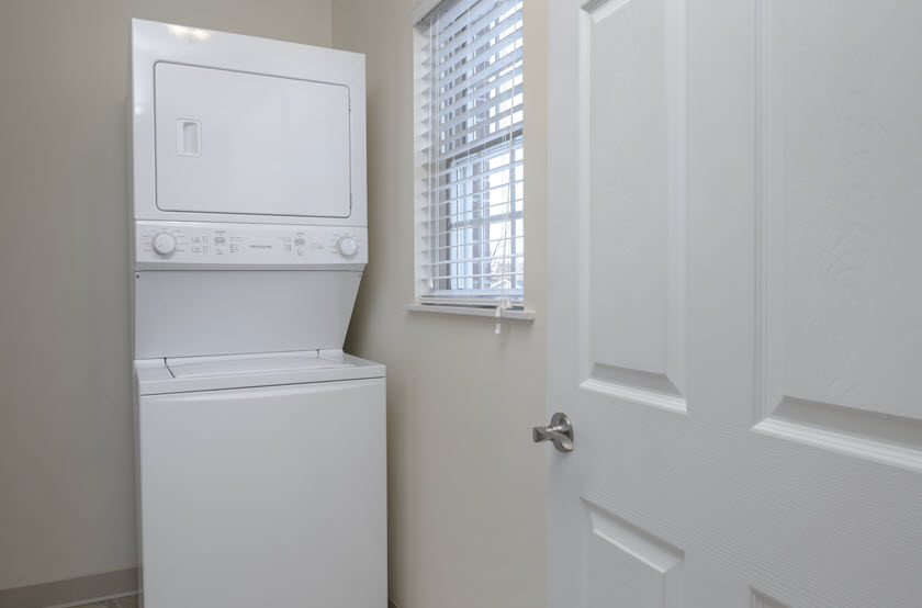 washer and dryer inside a cottage