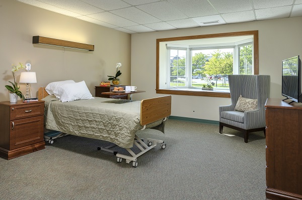 bedroom with window at riverwood nursing center