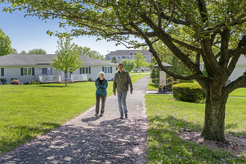 residents walking the trails of riverwoods