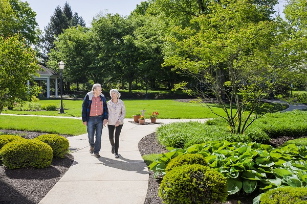 residents walking the paths at riverwoods