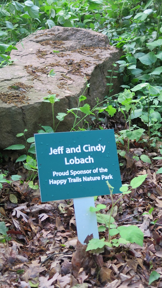 Jeff and Cindy Lobach sponsorship sign for happy trails nature park