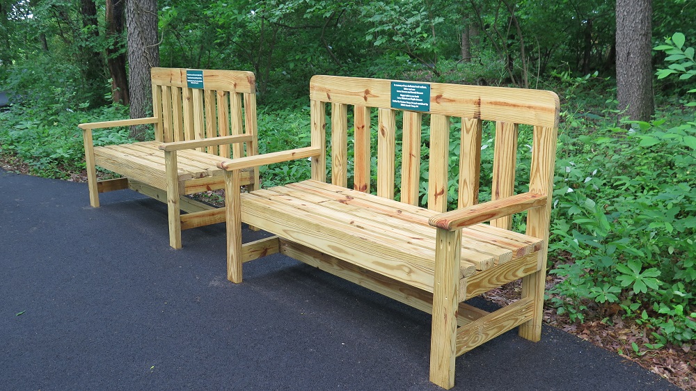 handmade benches honoring sponsors of happy trails nature park
