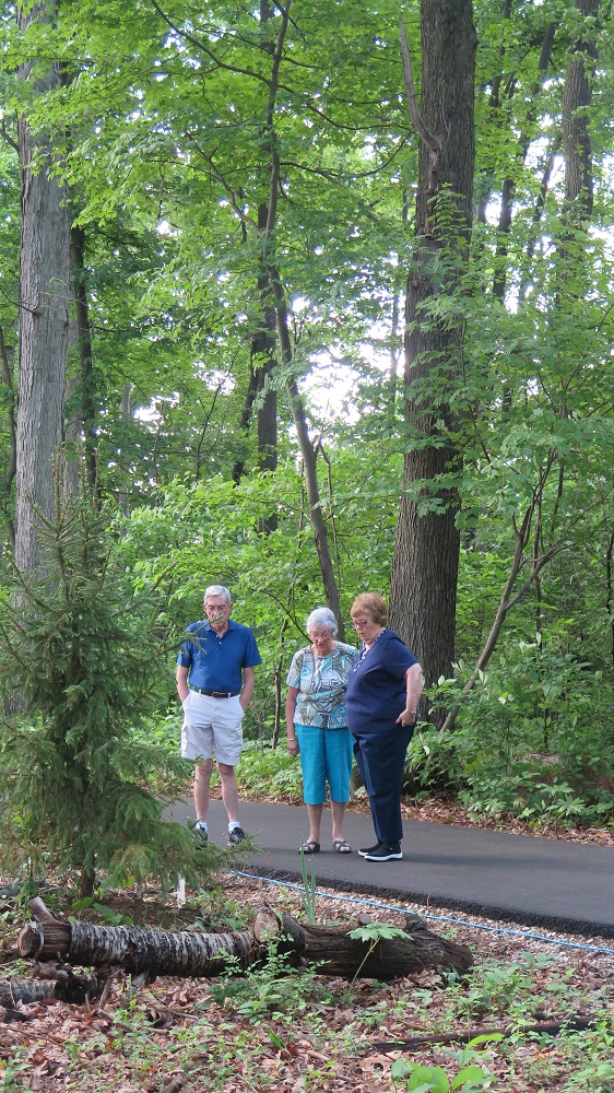residents walking the trails in happy trail nature park