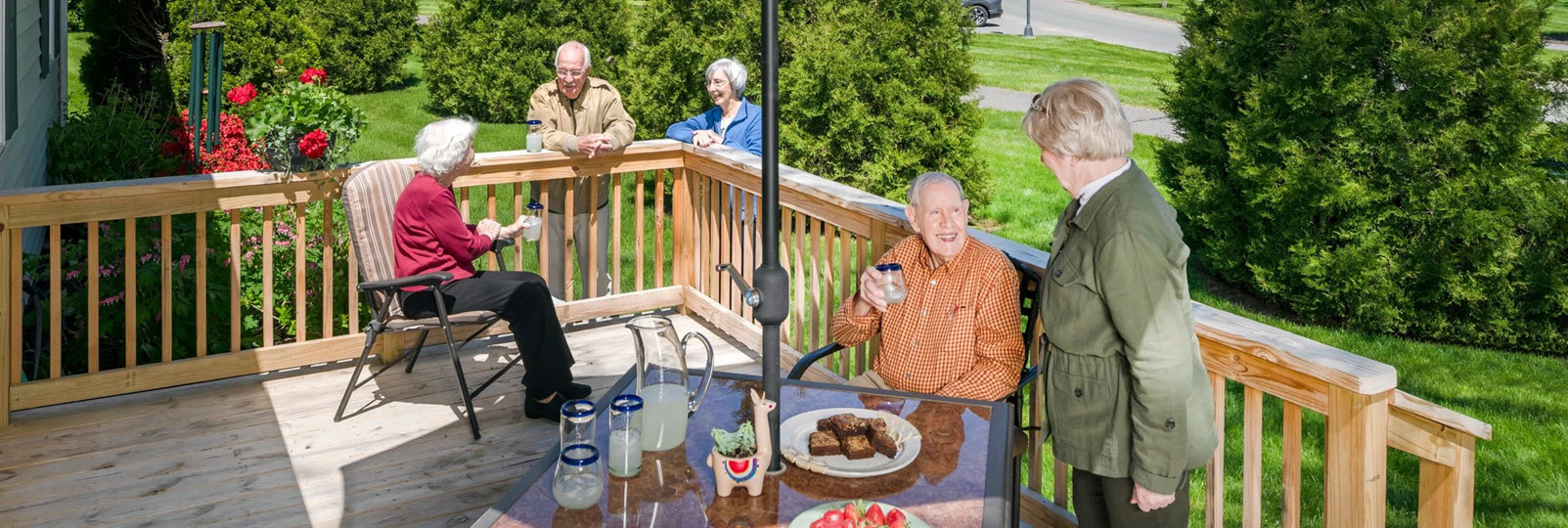 residents entertaining friends on their deck