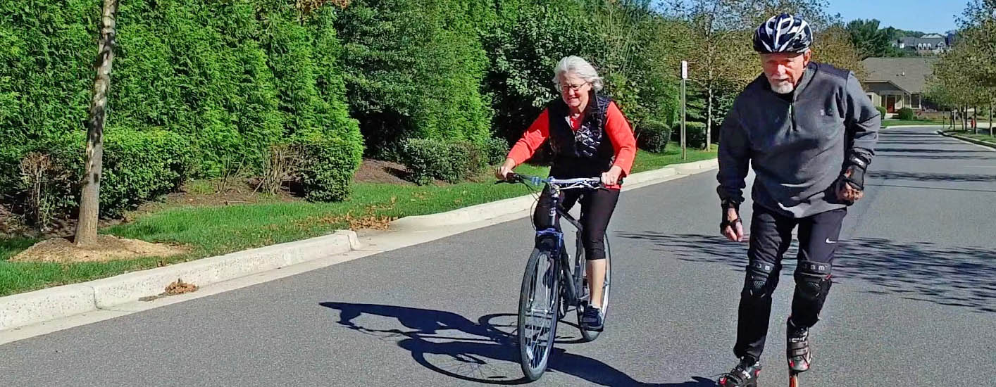 Two residents of Asbury Communities out for a ride and skate.