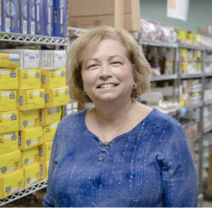 Asbury Solomons resident volunteering at Smile Food Pantry