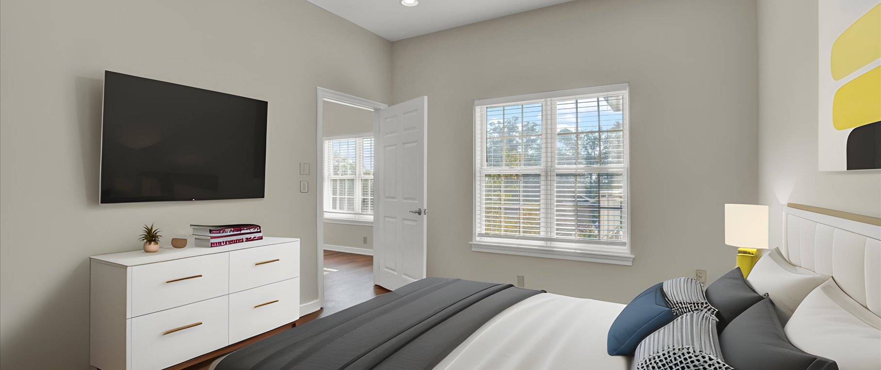 furnished bedroom with white and gray decor