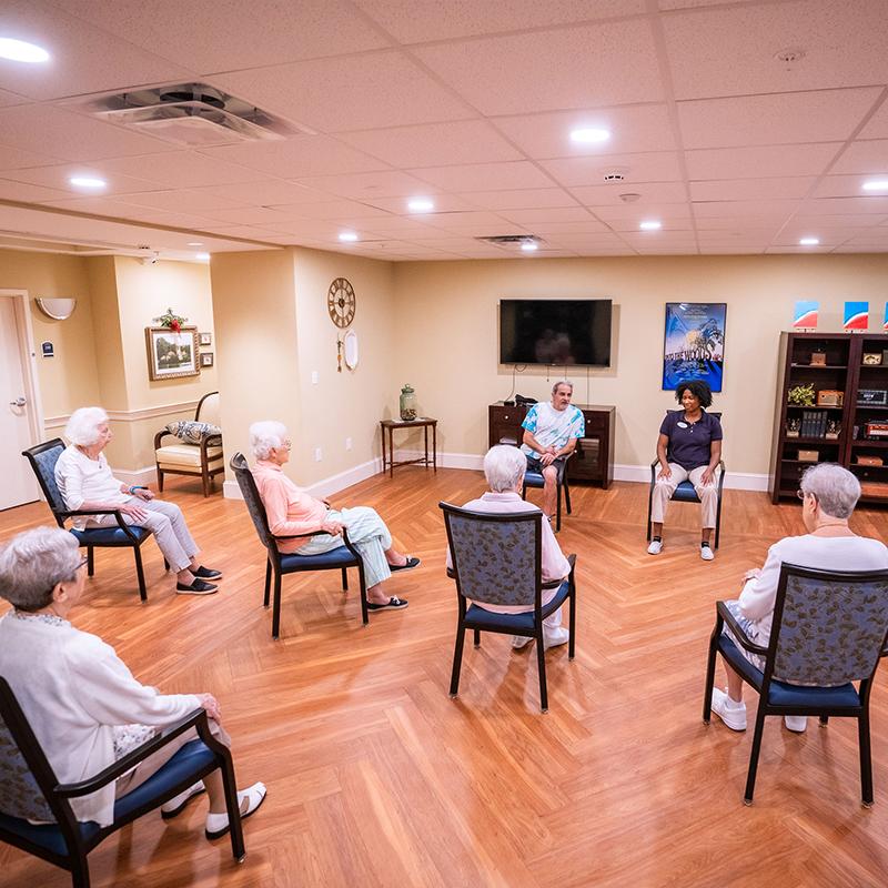 group of senior doing a class in a common room at ivy gables