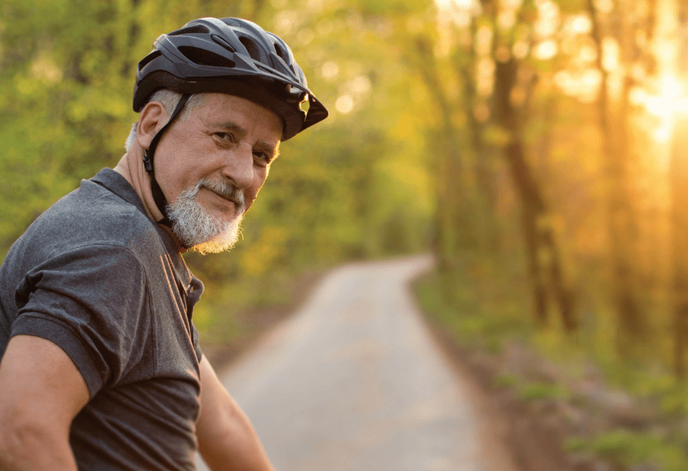 Man on bicycle in woods