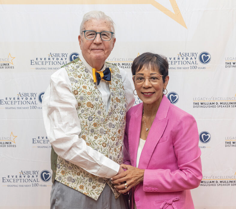 Senior man and woman posing for a photo